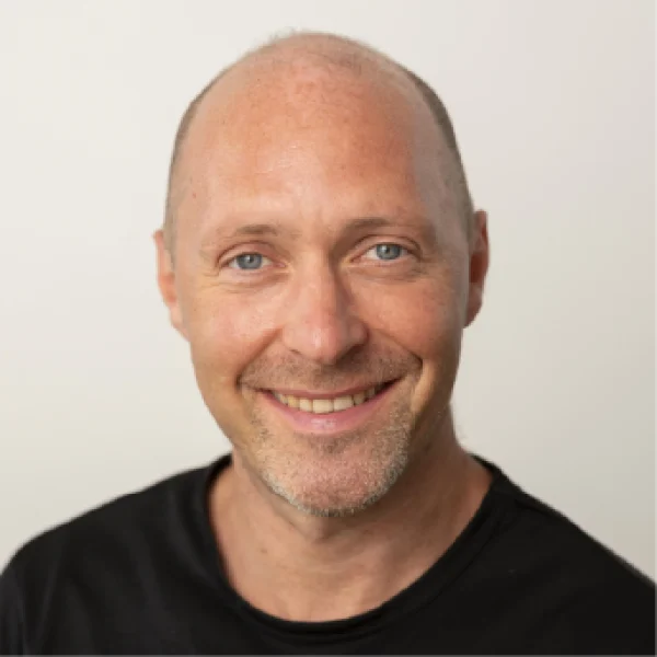 Portrait von Dogan Cinbir, Softwareentwickler bei der DriveCon GmbH und Mitverantwortlicher für die Entwicklung und Programmierung des Produkts MINGLECONTROL